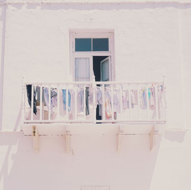 Low Angle View Of Clothes Drying In Balcony