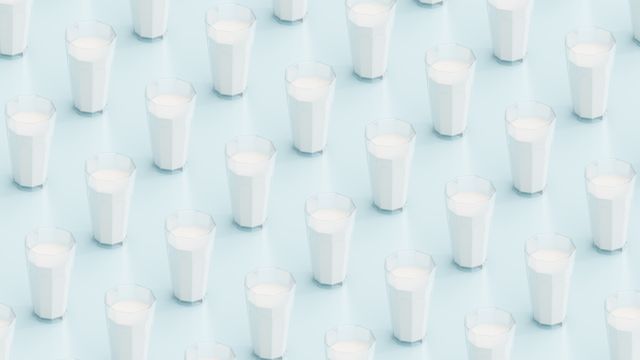 low poly glasses of milk pattern background