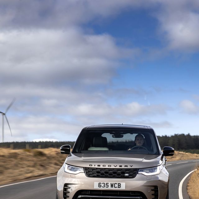 land rover discovery driving on road