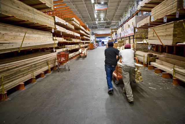 two men shop for lumber at a home depot store in the brooklyn borough of new york, on thursday, april 8, 2010 home depot is the largest us home improvement retailer photo by ramin talaiecorbis via getty images