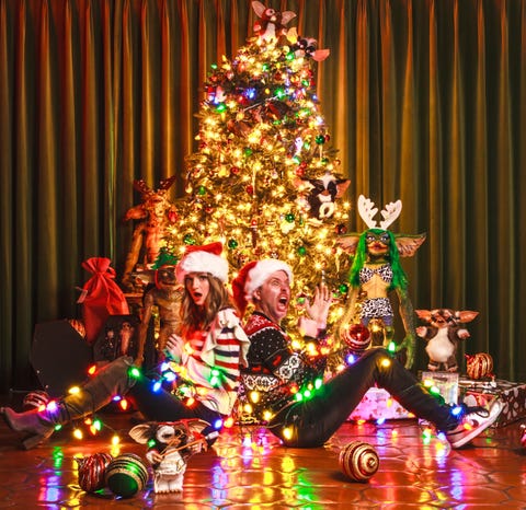 lydia hearst i chris hardwick ' s Gremlin tree christmas card photo