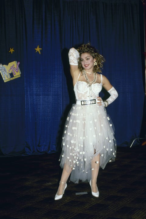 Madonna At MTV Awads subject subject singer madonna wearing whie lace lingerie and a "boy toy" belt standing with her arms raised to her head at 1st annual mtv awards at tavern on the green new york, ny september 14, 1984photographer david mcgoughdmitime life ownedmerlin 1151526