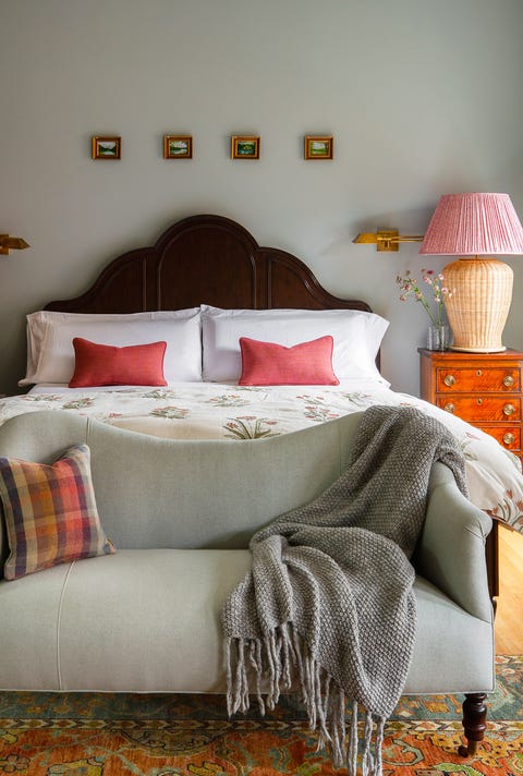 classic bedroom with small picture frames