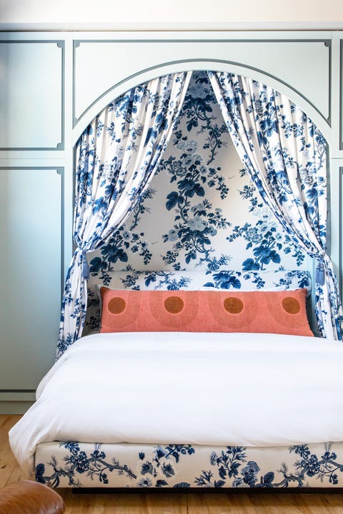 contemporary bedroom with blue toile uphosletry