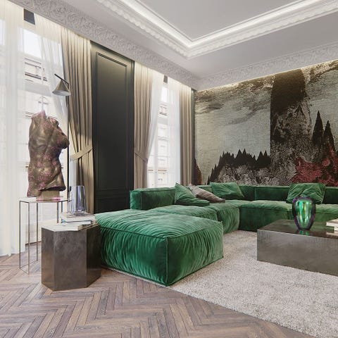 Loving room with green velvet modular sofa, torso sculpture and wall hanging