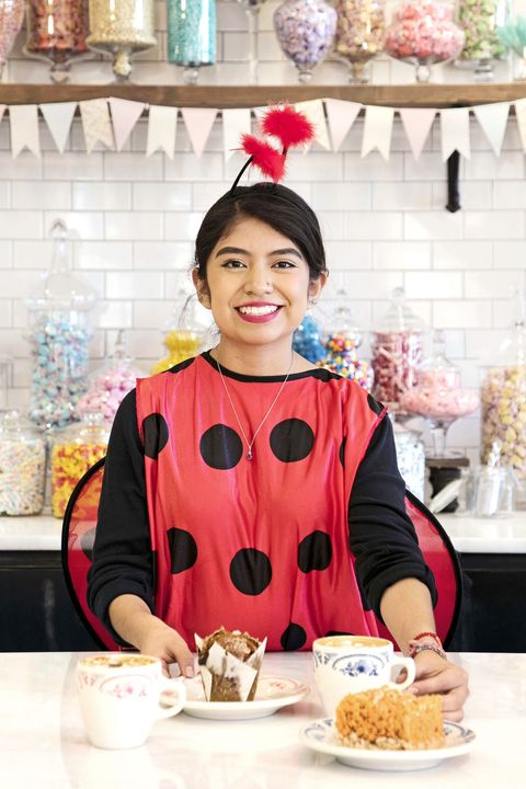 girl dressed in lady bug costume