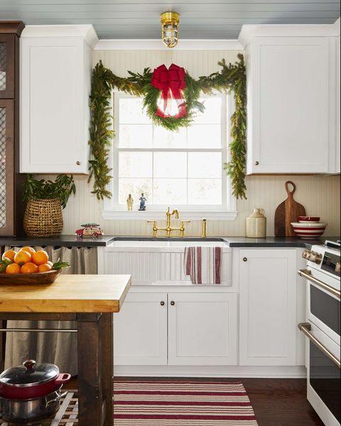 kitchen window with wreath and garland
