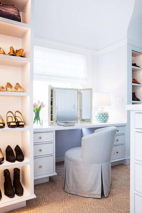light blue traditional vanity table in walk in closet