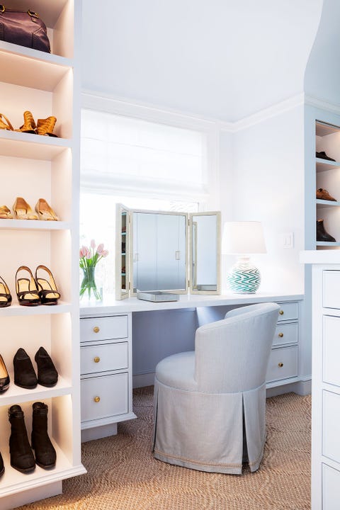 light blue traditional vanity table in walk in closet