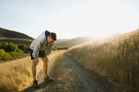 Male jogger resting