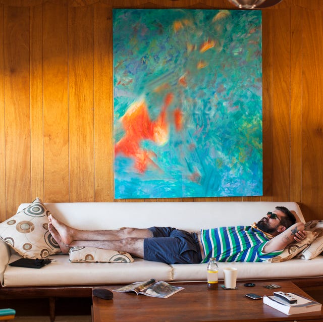 Man laying on sofa man laying on sofa