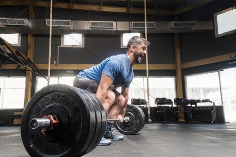 Trending Medical and health breaking news Man Lifting Weights At Gym Trending Medical and health breaking news man lifting weights at gym