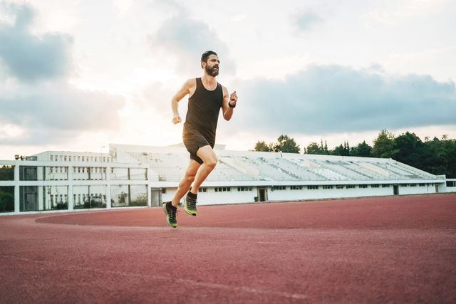 man running on the track to keep fit