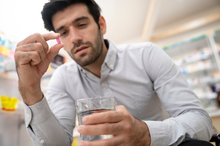 man-taking-medicine-royalty-free-image-1634540889
