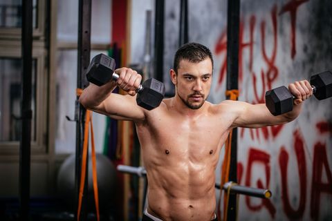 Man training with dumbbells