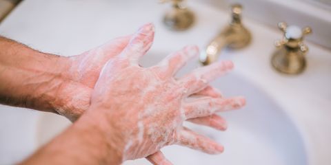 man washing hands, preventing spread of germs, bacteria and viruses