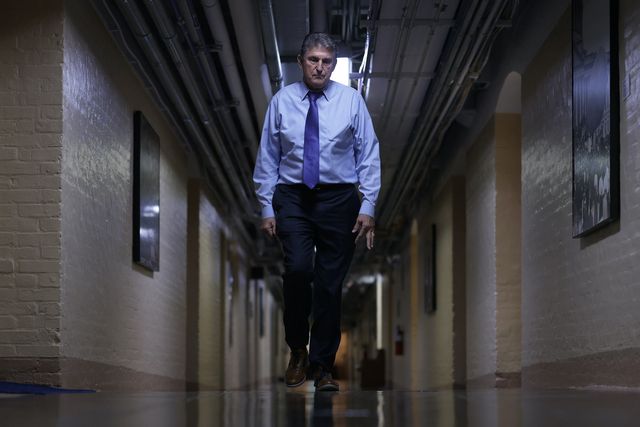 washington, dc   december 15 us sen joe manchin d wv walks through a hallway in the basement of the us capitol december 15, 2021 in washington, dc president joe biden said on wednesday that he would support to push the vote for the build back better legislation to 2022 and for the senate to pass a voting rights bill instead photo by alex wonggetty images