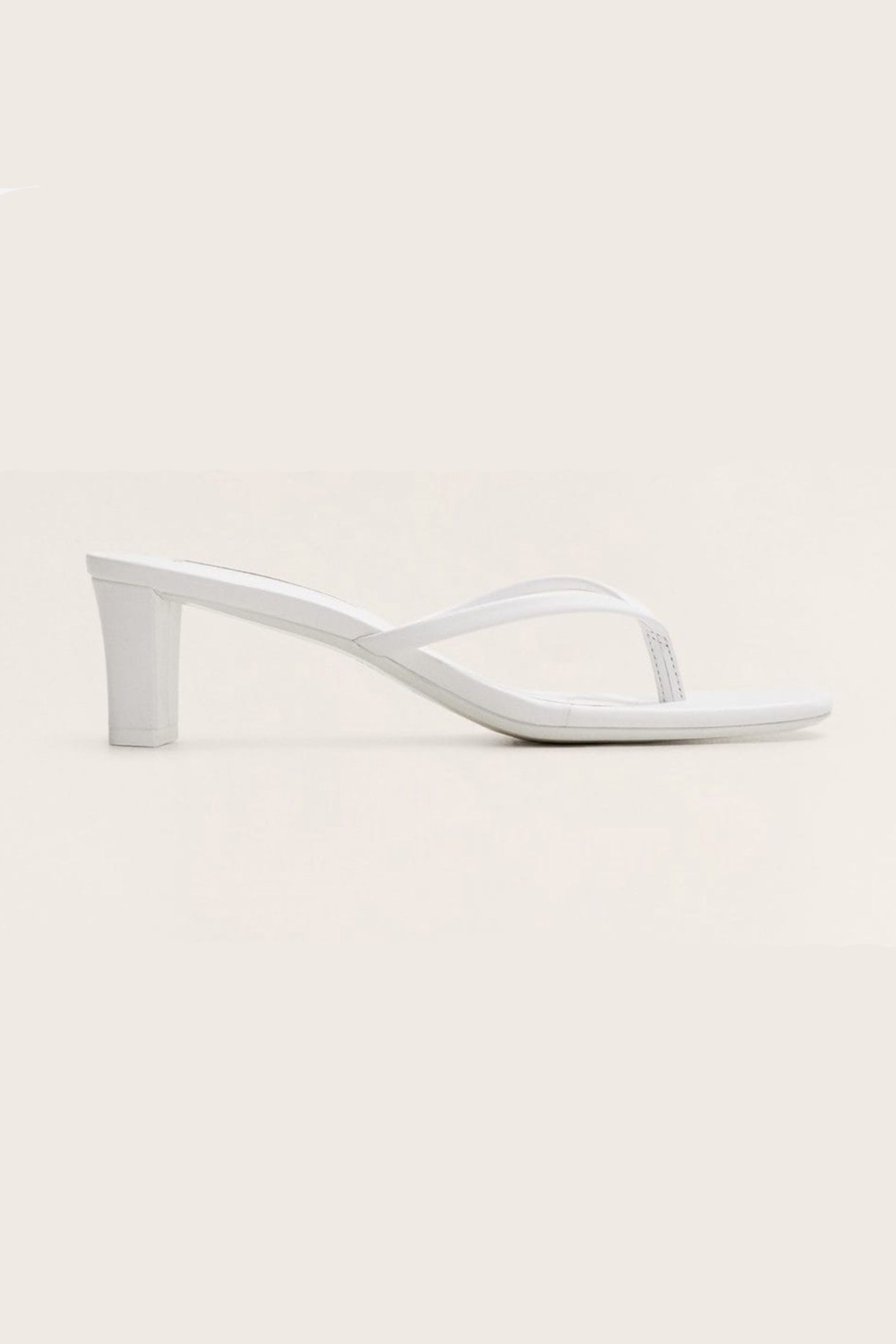 white heeled flip flops