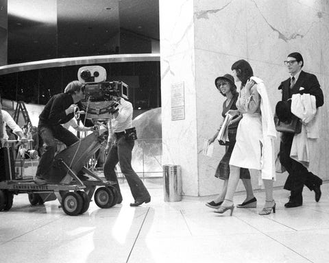 margot kidder and christopher reeve on the set of superman at the new york daily news offices