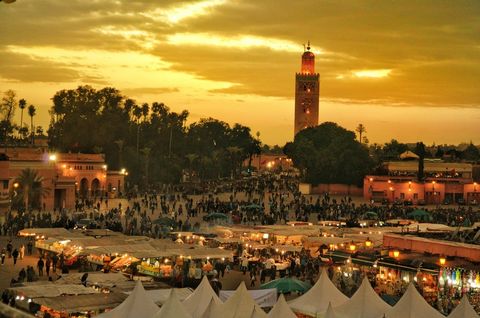City, Tower, Public space, Tent, Crowd, Clock tower, Evening, Dusk, Town square, Human settlement, 