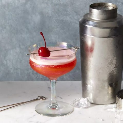 a pink mary pickford cocktails with a cherry on top