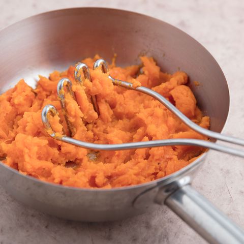 mashed baked sweet potato in a pan