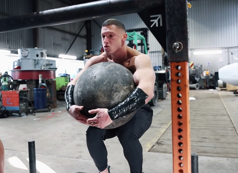 Watch a Fitness Influencer Get Wrecked by the World's Strongest Man's Workout