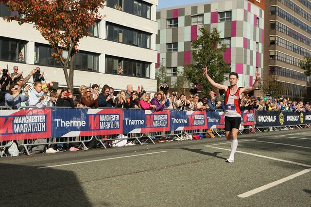 manchester marathon winner matt crehan crossing the finish line