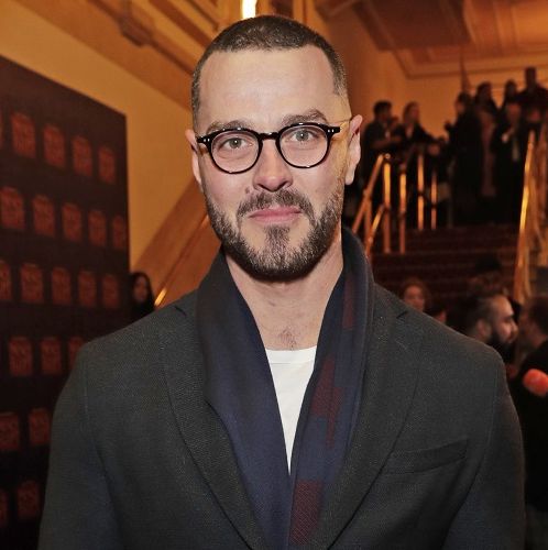 matt willis poses on the red carpet at a theatre performance in february 2020