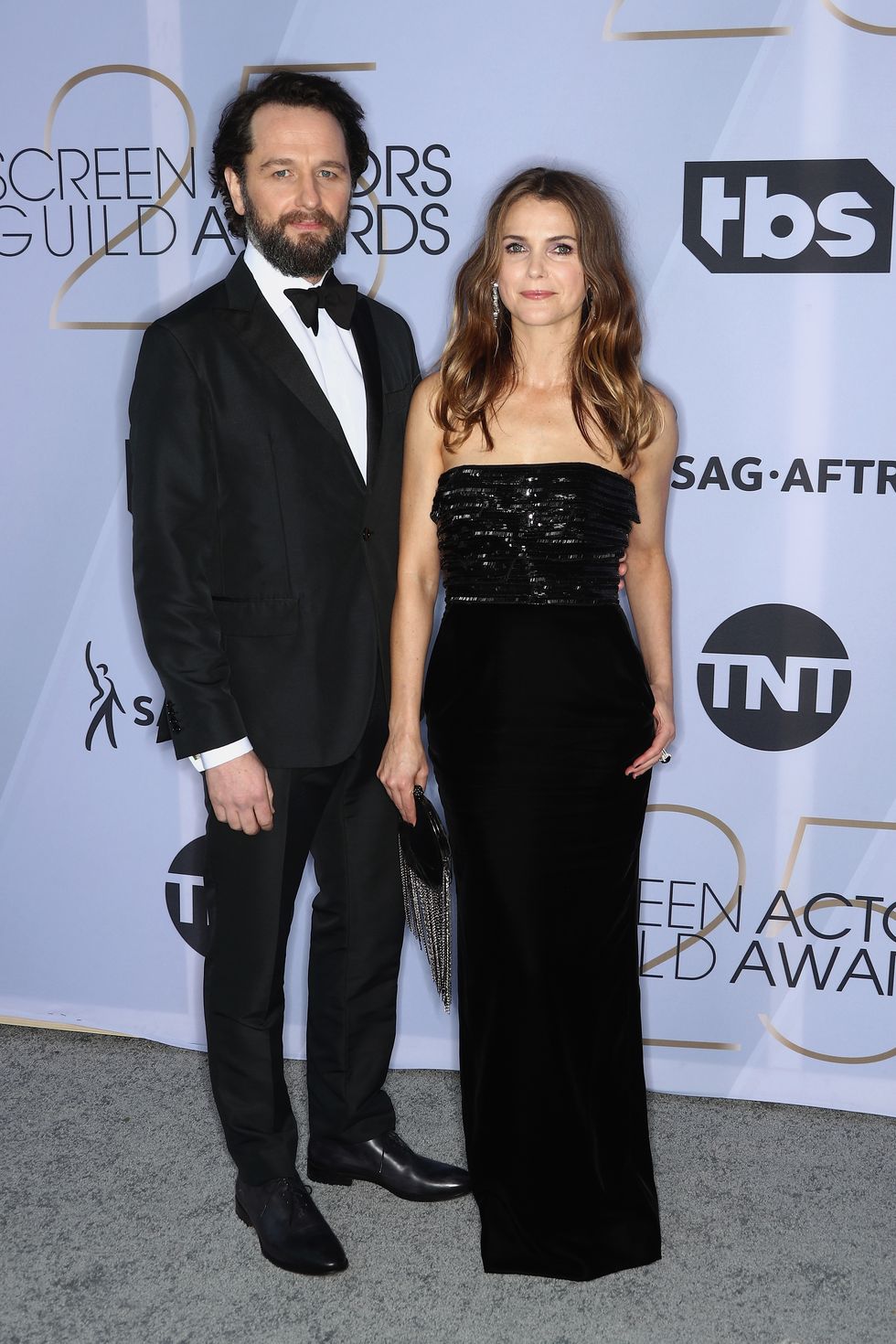 https://hips.hearstapps.com/hmg-prod.s3.amazonaws.com/images/matthew-rhys-and-keri-russell-attend-the-25th-annual-screen-news-photo-1090478838-1548637808.jpg?crop=1xw:1xh;center,top&amp;resize=980:*