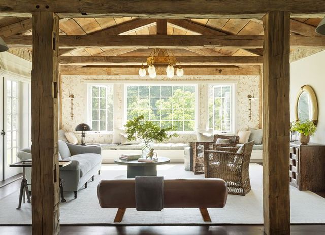 living room with reclaimed ceiling beams