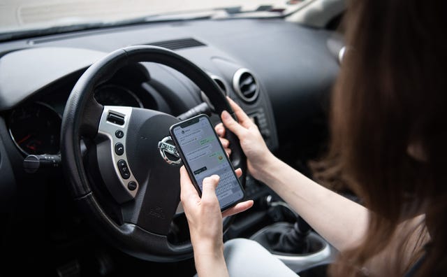 Cell phone on the road Cell phone on the road