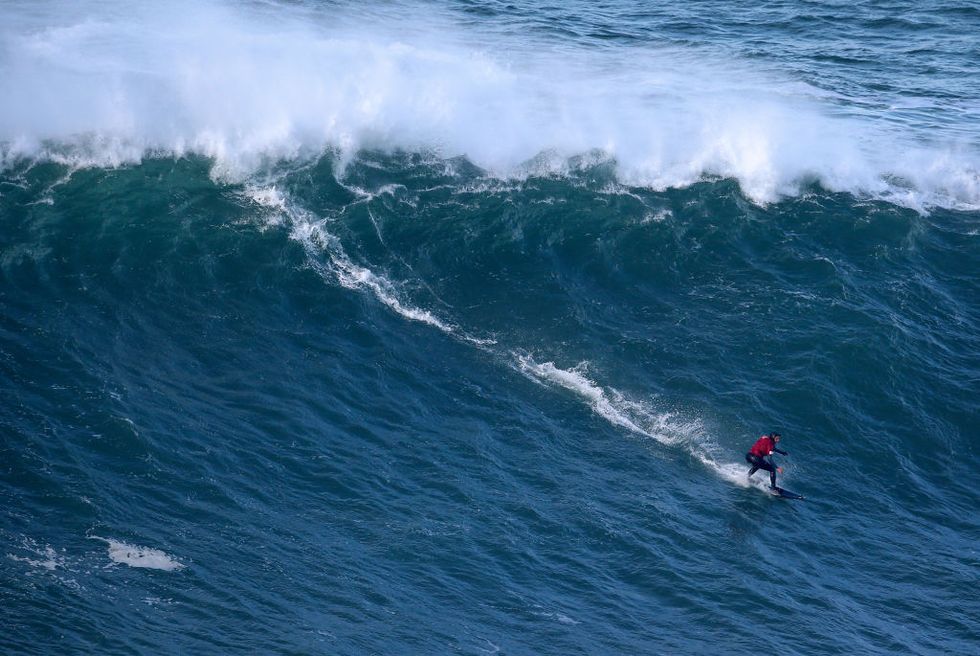 This Woman Just Broke the World Record for Highest Wave Ever Surfed thumbnail