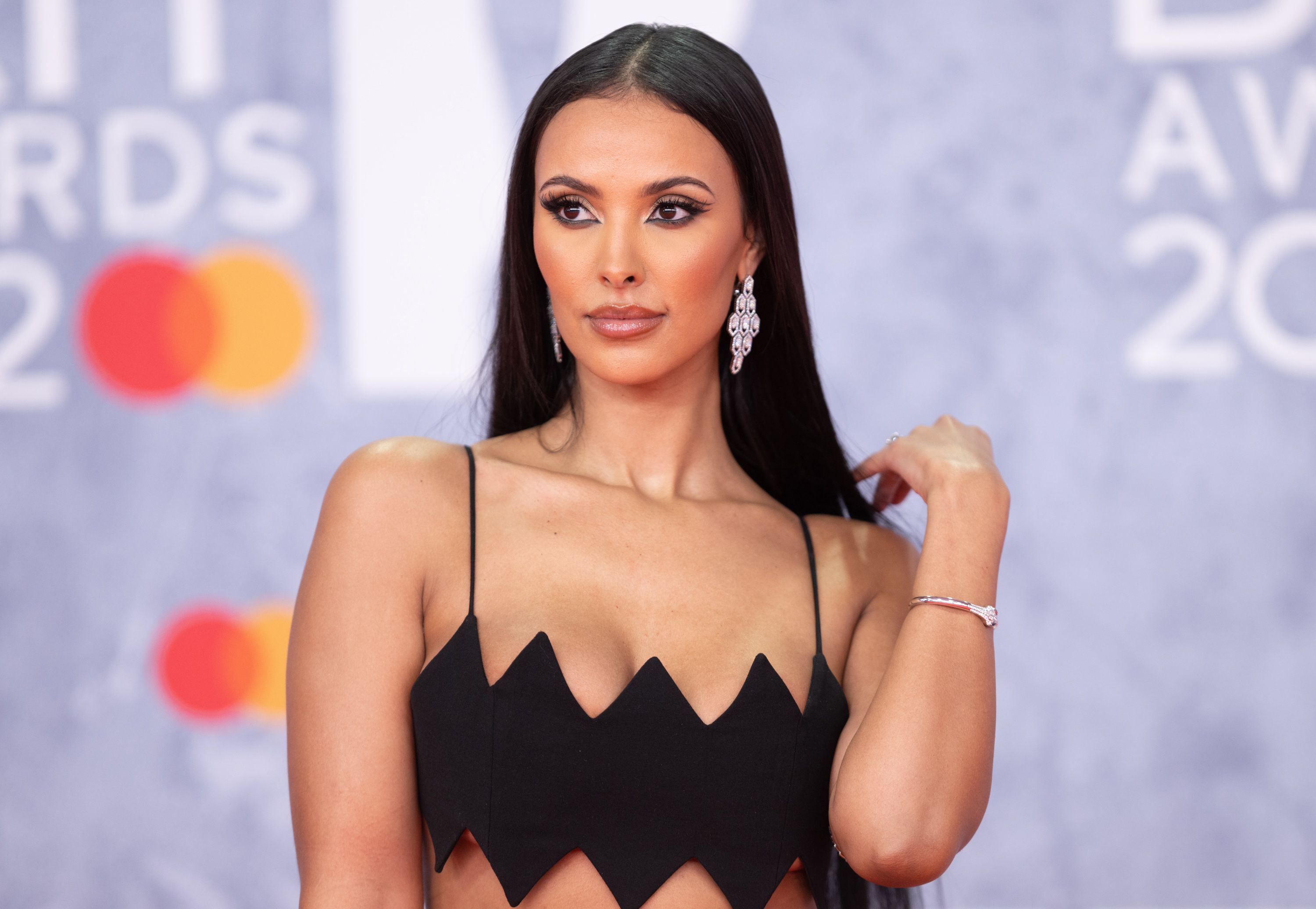 Maya Jama wears stunning natural curls to sit courtside at London