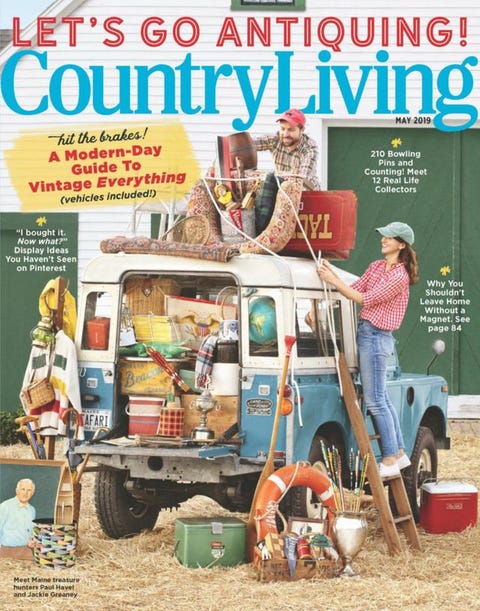 country living magazine cover featuring a couple on an antiquing trip