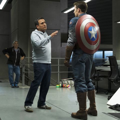 CAPTAIN AMERICA: THE WINTER SOLDIER, from left: Anthony Mackie, director Joe Russo, Chris Evans, 201