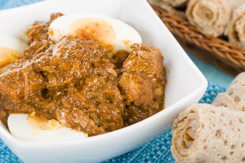 Meat curry with egg and rolled bread