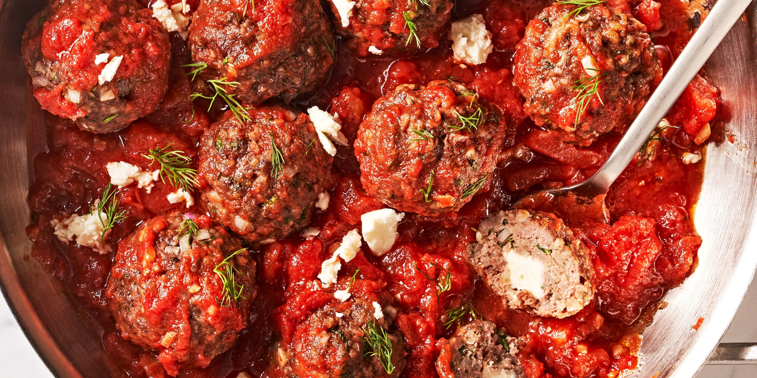 These Feta-Stuffed Meatballs Are The Mediterranean Upgrade The Classic Pasta Pairing Was Waiting For