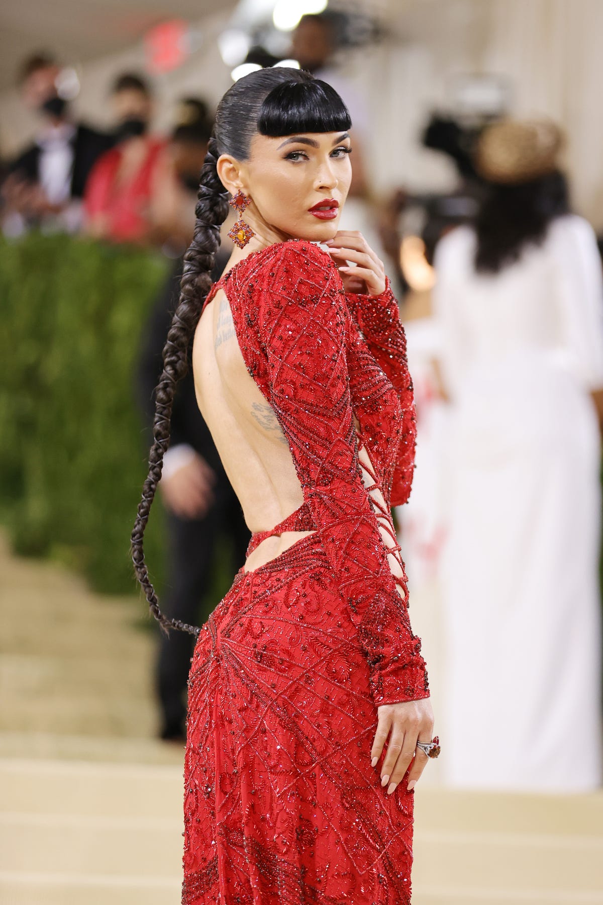 Megan Fox Wears a Red Lace-Up Dress at the 2021 Met Gala