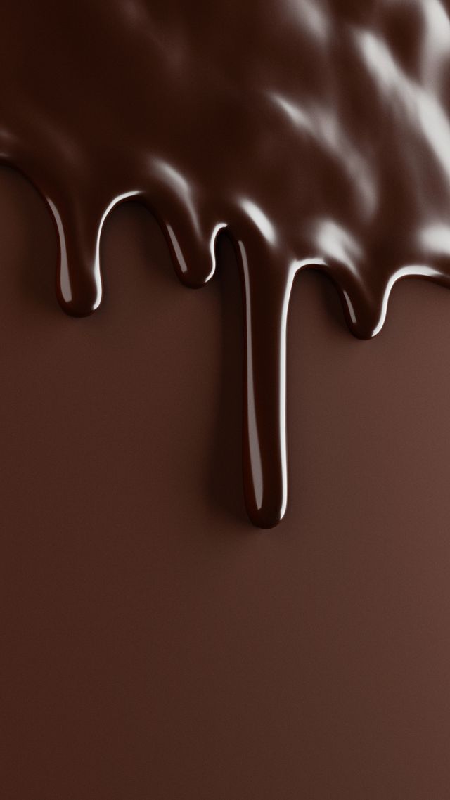 melted chocolate drips over brown background