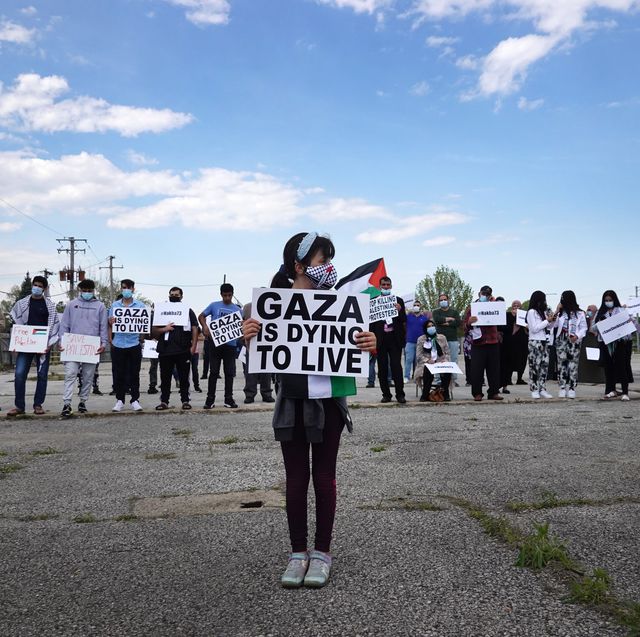 activists demonstrate against israel's actions against palestinians