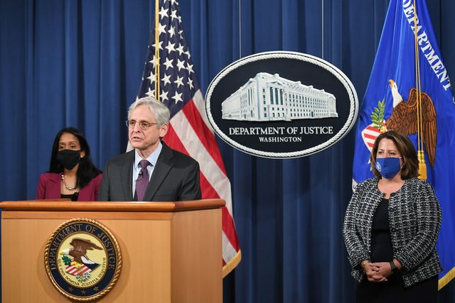 washington, dc   april 26 us attorney general merrick garland delivers a statement at the department of justice flanked by vanita gupta, associate us attorney general l and lisa monaco, deputy us attorney general on april 26, 2021 in washington, dc garland announced that the justice department will begin an investigation into the policing practices of the louisville police department in kentucky a report of any constitutional and unlawful violations will be published photo by mandel ngan poolgetty images