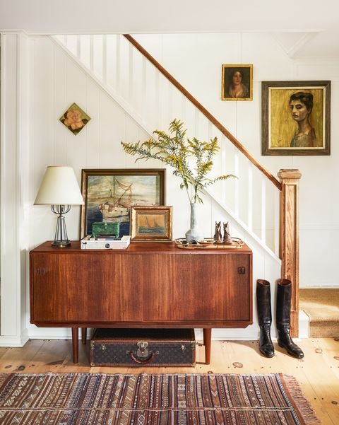modern farmhouse entry with midcentury credenza