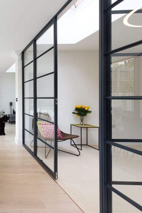 Internal steel framed double doors in Mill Hill house the steel framed double doors allows the homeowners of this house in mill hill