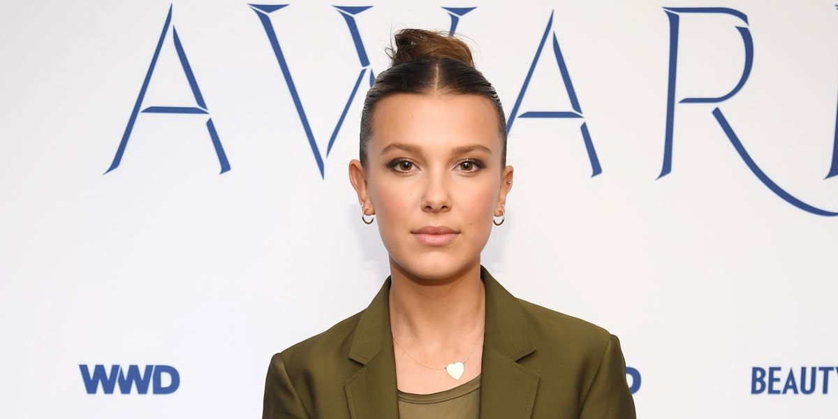 Millie Bobby Brown sports a parted fringe and long wavy hair