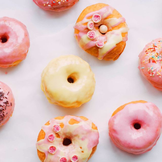 pink and yellow mini donuts with sprinkles