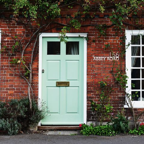 front door paint  mint green door with personalised house number sign