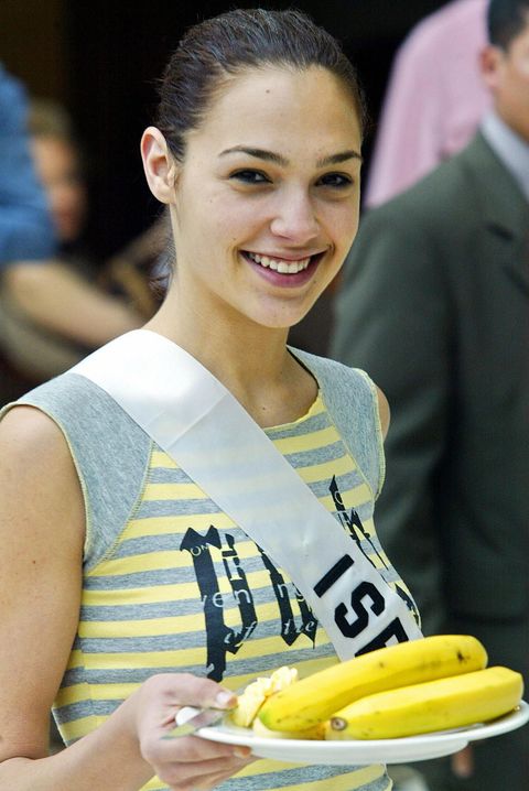 miss israel gal gadot smiles as she hold