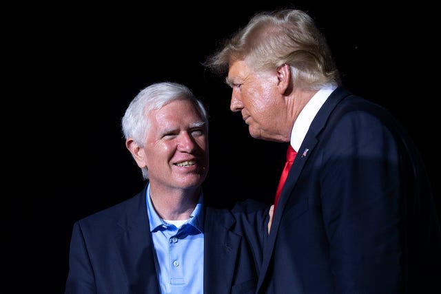 Former President Donald Trump Holds A Rally In Alabama cullman, alabama august 21 former us president donald trump r welcomes candidate for us senate and us rep mo brooks r al to the stage during a