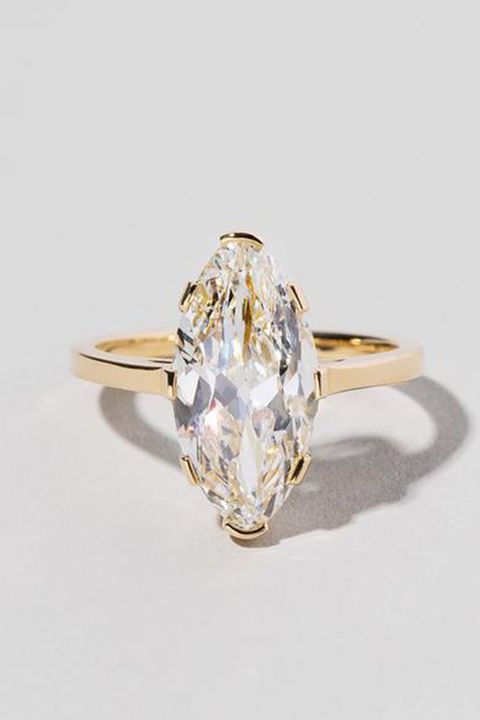 Ring, Engagement ring, Jewellery, Fashion accessory, Diamond, Gemstone, Pre-engagement ring, Yellow, Body jewelry, Wedding ring, 